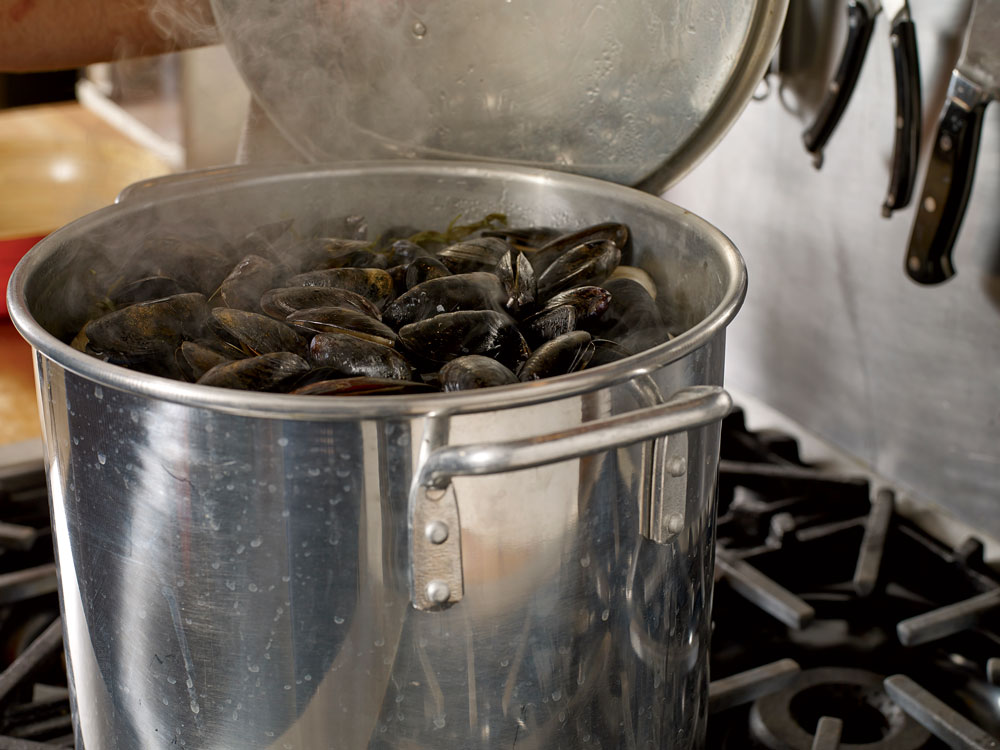 Step 2: After the lobsters and clams have cooked 6 minutes, add the mussels.