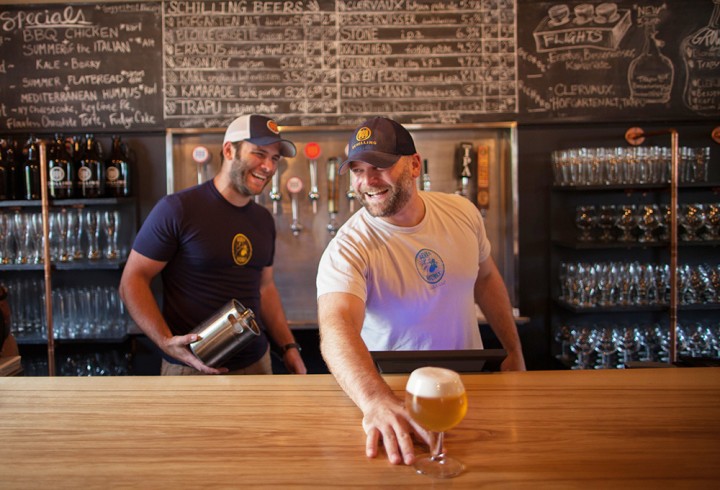 Brothers Stuart and Jeff Cozzens serve up some of their European-inspired beer at Schilling Beer Co.
