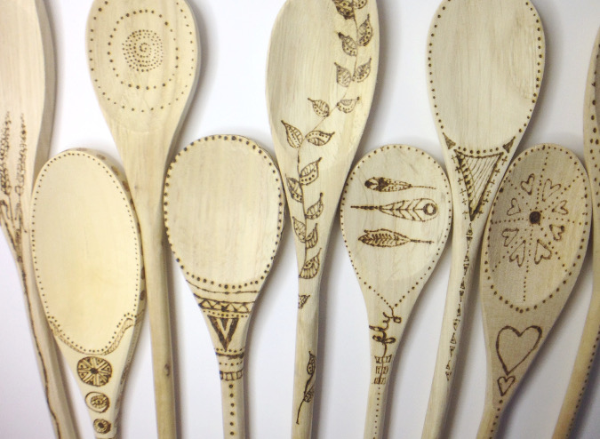 Wooden spoons designed with pyrography