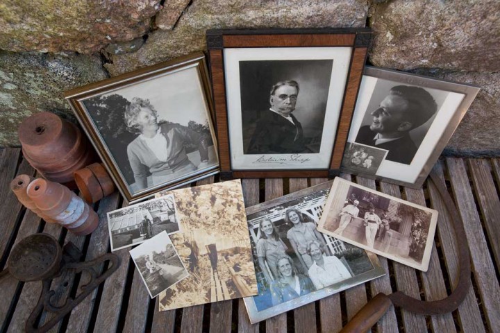  Stone Acres passed through several generations of the interrelated Phelps, Edwards, and Paffard families over the years;  shown here are photos of some of the 20th-century members, including framed portraits of Erskine Phelps, a prominent Chicago businessman (middle), flanked by Edith Rizer Paffard (Chris Careb’s first employer) and her husband, Dr. Frederic Paffard.