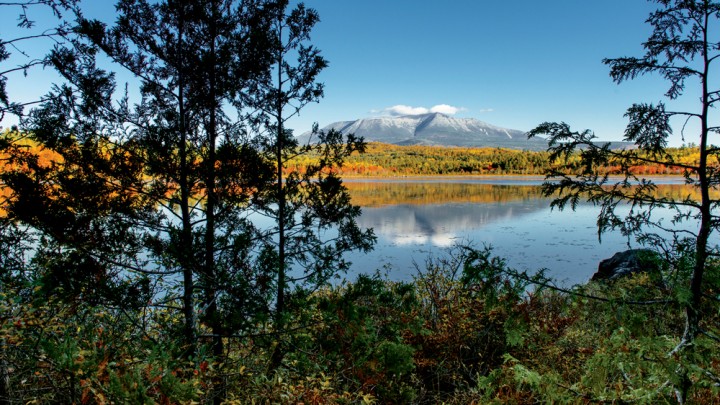 Majestic Katahdin, “Greatest Mountain” to the Penobscot people, and the northern terminus of the Appalachian Trail, rises almost a mile above the surrounding landscape. 