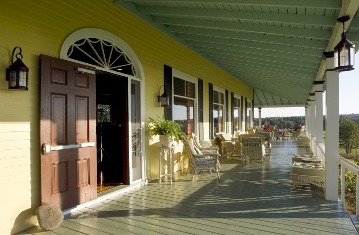 The Inn's famously long porch, evening home to some of the finest sunset views in New England.