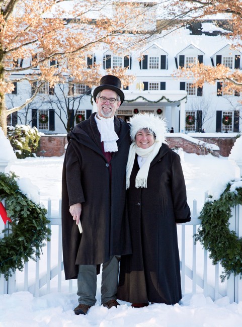 At the Woodstock Inn, "town crier" Eric Fritz and musician Kerry Rosenthal don vintage dress fro Wassail Weekend caroling.
