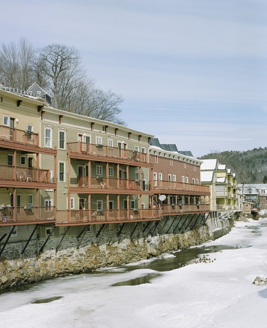The Winooski River winds along housing at the edge of downtown. 