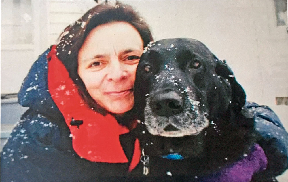 Survivors: The author with Gus, her Lab, two days after their rescue from the freezing waters of the Sandy River, a tributary of the Kennebec in western Maine. 