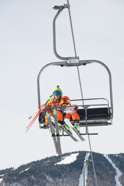 Generations continue the skiing tradition catching a ride on one of several quad chairs lift at the resort.