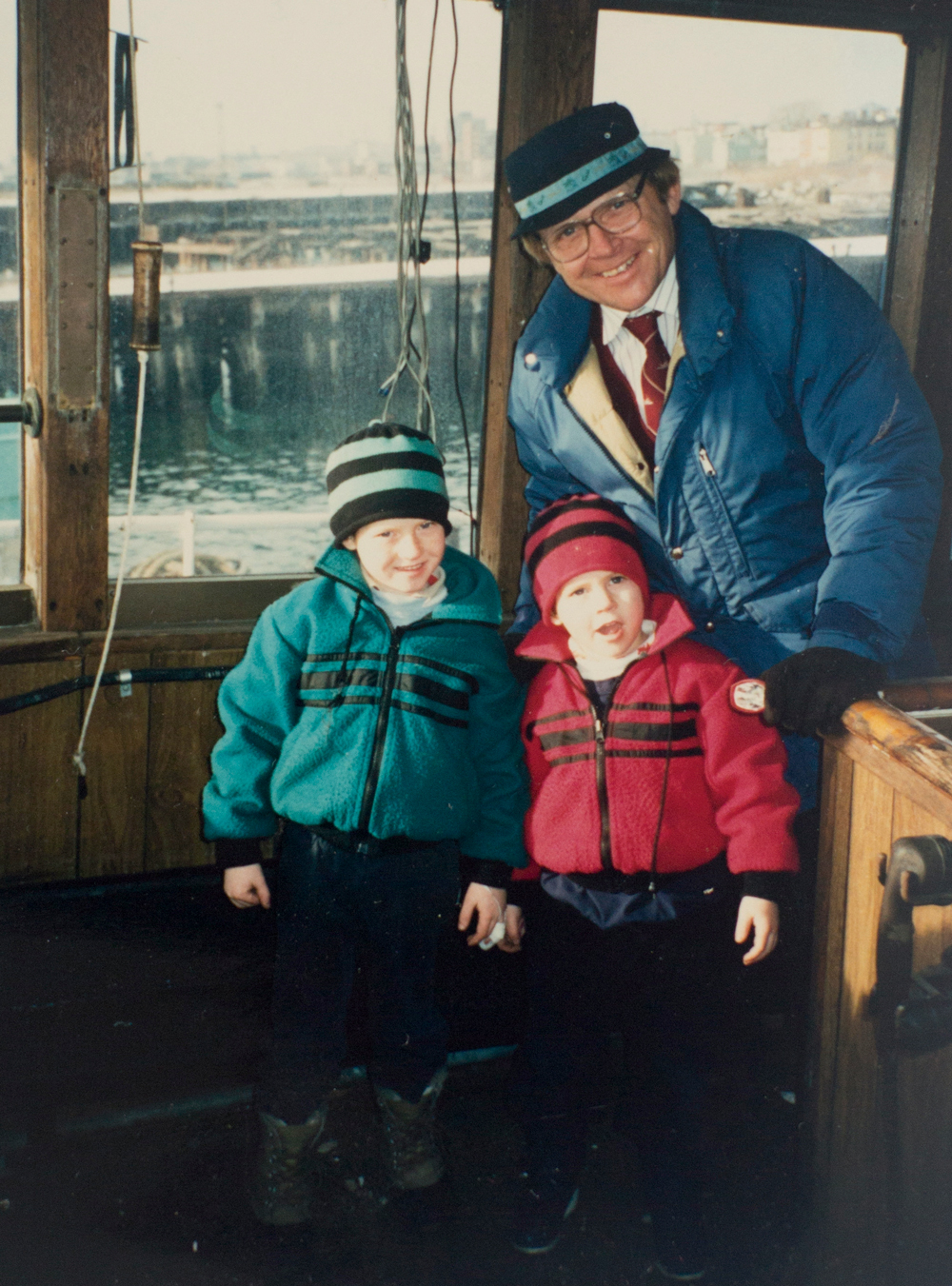 Doug (left) and Patrick Fournier with their late father, Arthur J. Fournier. “My father never [eased back],” Doug says today. “He could never let go … Three years before he died he could race up and down a ladder twice as fast as me.”