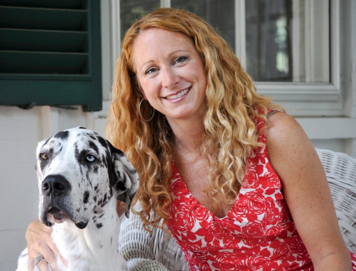 Current owner Maureen Weaver with Duchess, her harlequin Great Dane. Maureen and her six siblings grew up on Summer Street.