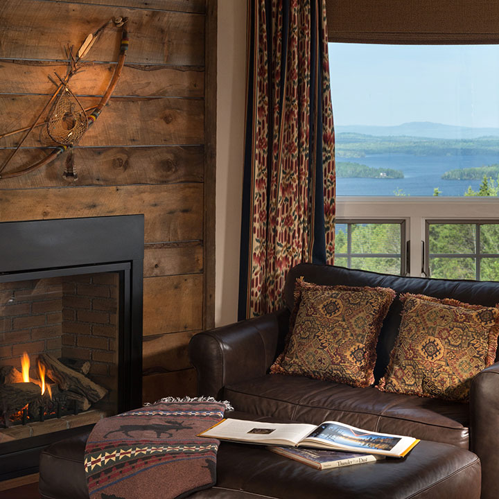 Warm up by the fire and take in the water views at the Lodge.