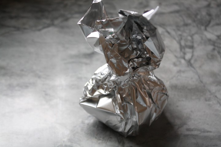 Wrap the foil up around the beat, pinching it together at the top.