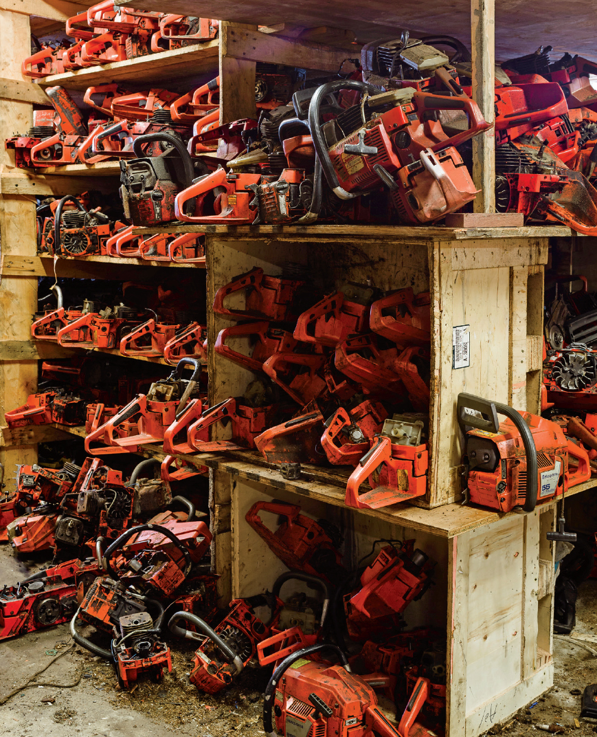 Among the store’s huge inventory of old and new equipment, chainsaw parts from a variety of makes and models await repair or recycling.