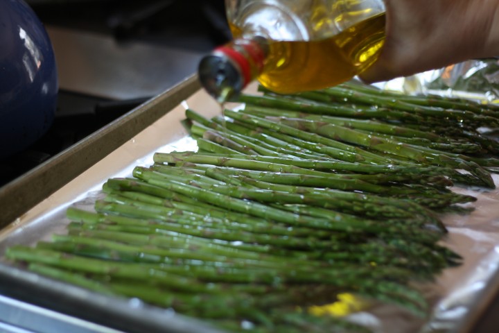 Drizzle just enough to lightly coat each stalk, 2 to 3 tablespoons total. 