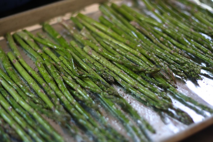 Arrange the spears so they're not all bunched in the center of the sheet.