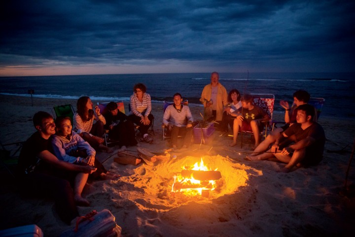 “You make a reservation and get a bonfire permit, but it’s free and simple,” Dom says. “We look forward to this all year. We make s’mores and enjoy the sunset while watching waves and the dune grasses. The kids (myself and my cousins) are in charge of gathering wood and starting the fire, and I insist on starting it with only a single match, so it’s got to be done right. This is the whole crew from this year: siblings, cousins, parents, friends.”