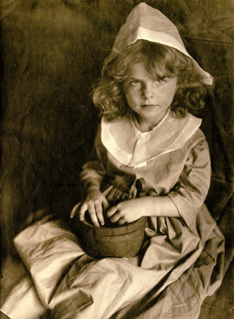 Little Puritan, above, shows a local child, 5-year-old Elizabeth Everett, portraying Eunice Williams in the Old Deerfield Pageant of 1911.