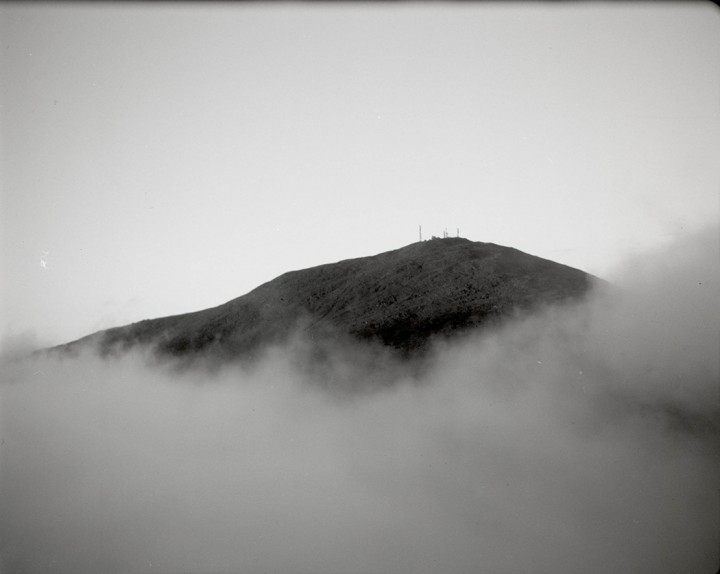 The summit of Mt. Washington, home to the Mount Washington Observatory weather center, sits high above the clouds. 