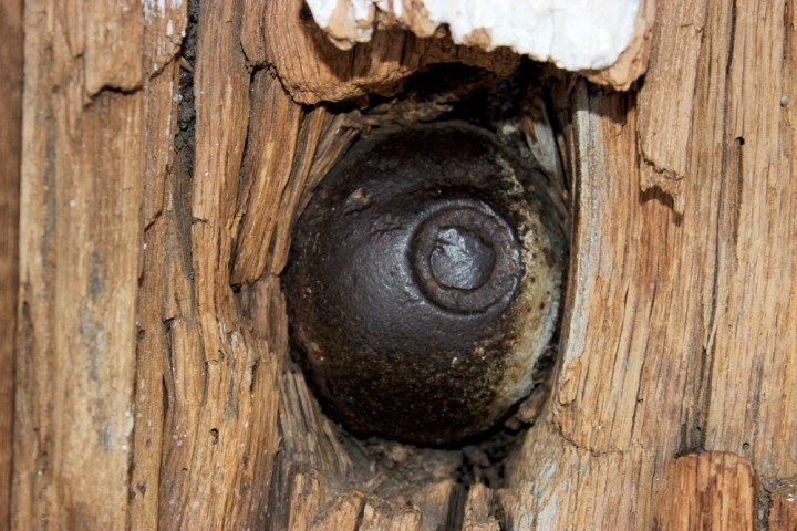The infamous British cannonball, in place since 1777.