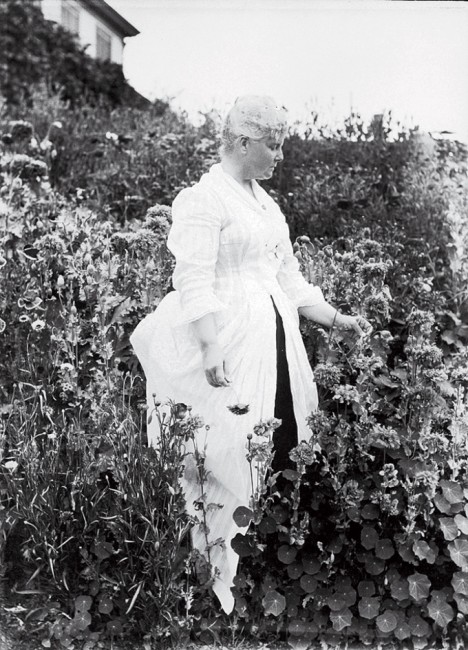 Celia Thaxter believed there was magic in the waves. “The eternal sound of the sea on every side” could wash away all thoughts of the mainland, leaving your perception “blurred and softened like a sketch in charcoal.” Above: Celia Thaxter in her garden, August 1889. 