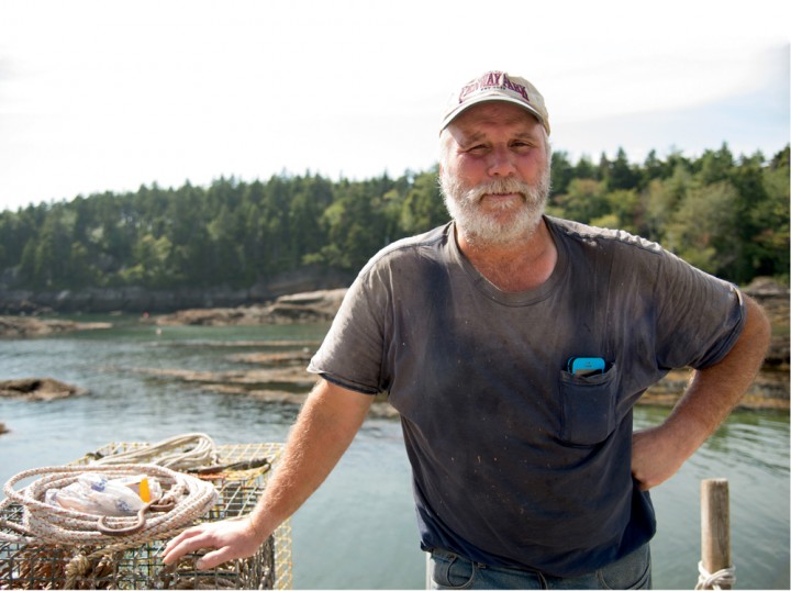 Clinton Wallace hauls lobsters on Phippsburg’s West Point pier.