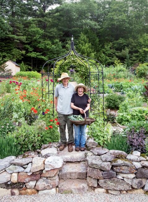 Bill and Eileen Elliott in their garden in Hancock, New Hampshire. It began as a 20-by-20-foot plot carved out of the woods; today it covers 2 acres.