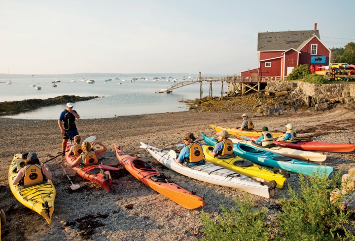 A flotilla prepares to depart H2Outfitters on Bailey Island.