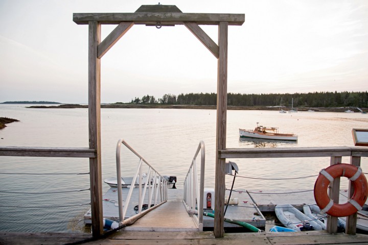 Guests at Sebasco Estates hop aboard the Ruth, moored in the distance, to sightsee.