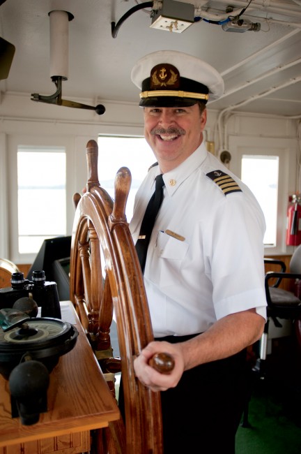 Captain Jim Morash pilots the 230-foot M/S Mount Washington cruise ship, stopping in Wolfeboro.