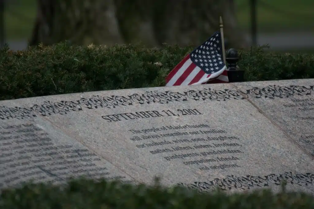 Ticket Agent Mike Tuohey Can’t Forget 9/11 | Yankee Classic. A granite memorial inscribed with “September 11, 2001” and an American flag placed above it.
