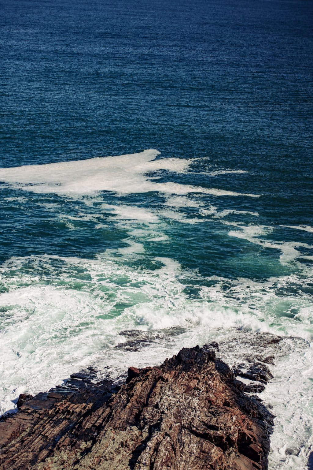 Waves at the foot of Bald Head Cliff