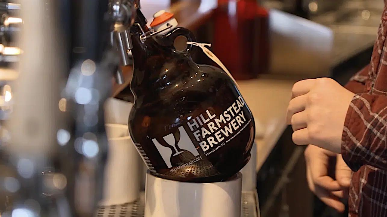 beer bottle filling at hill farmstead brewery in Vermont.
