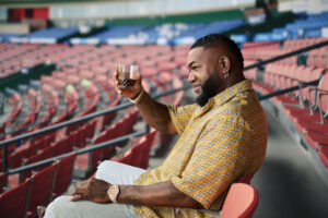 Big Papi David Ortiz raises a glass of Ozama Rum at Fenway Park.