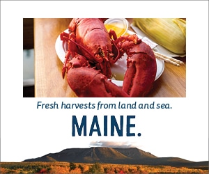 Fesh harvests from land and sea (a lobster is pictured)