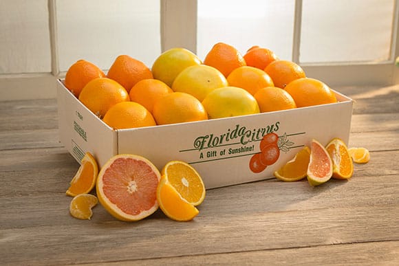 A box of oranges and grapefruit