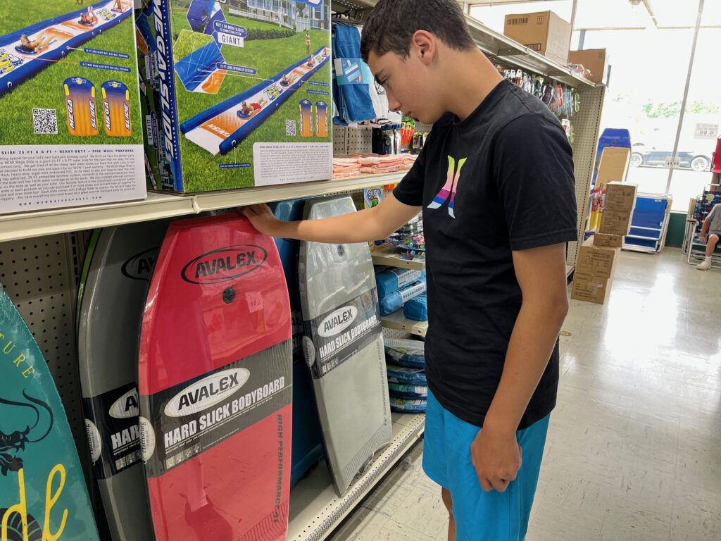 Bodyboard shopping at Renys in Maine