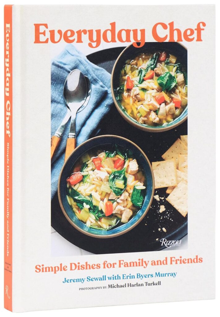 Cover of "Everyday Chef" cookbook with two bowls of soup, crackers, and a spoon on a white background.