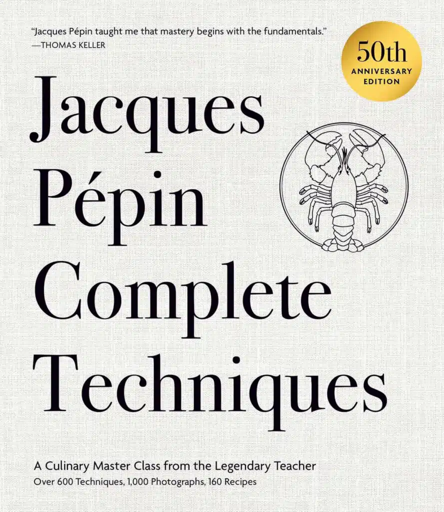 Book cover of "Jacques Pépin Complete Techniques" with a lobster illustration and a gold 50th anniversary badge.