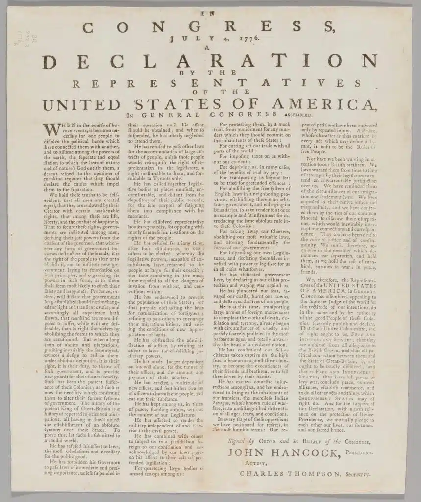 The Declaration of Independence printed as a broadside, with text in two columns and signatures at the bottom.