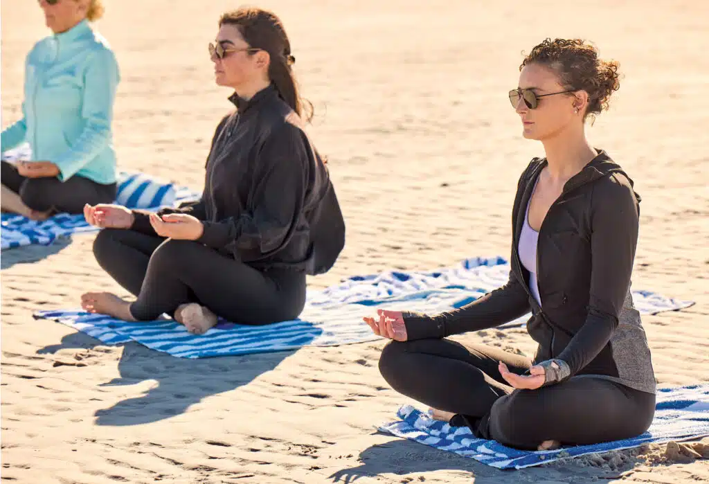 Yoga on the beach at Cape Cod's Ocean Edge Resort.