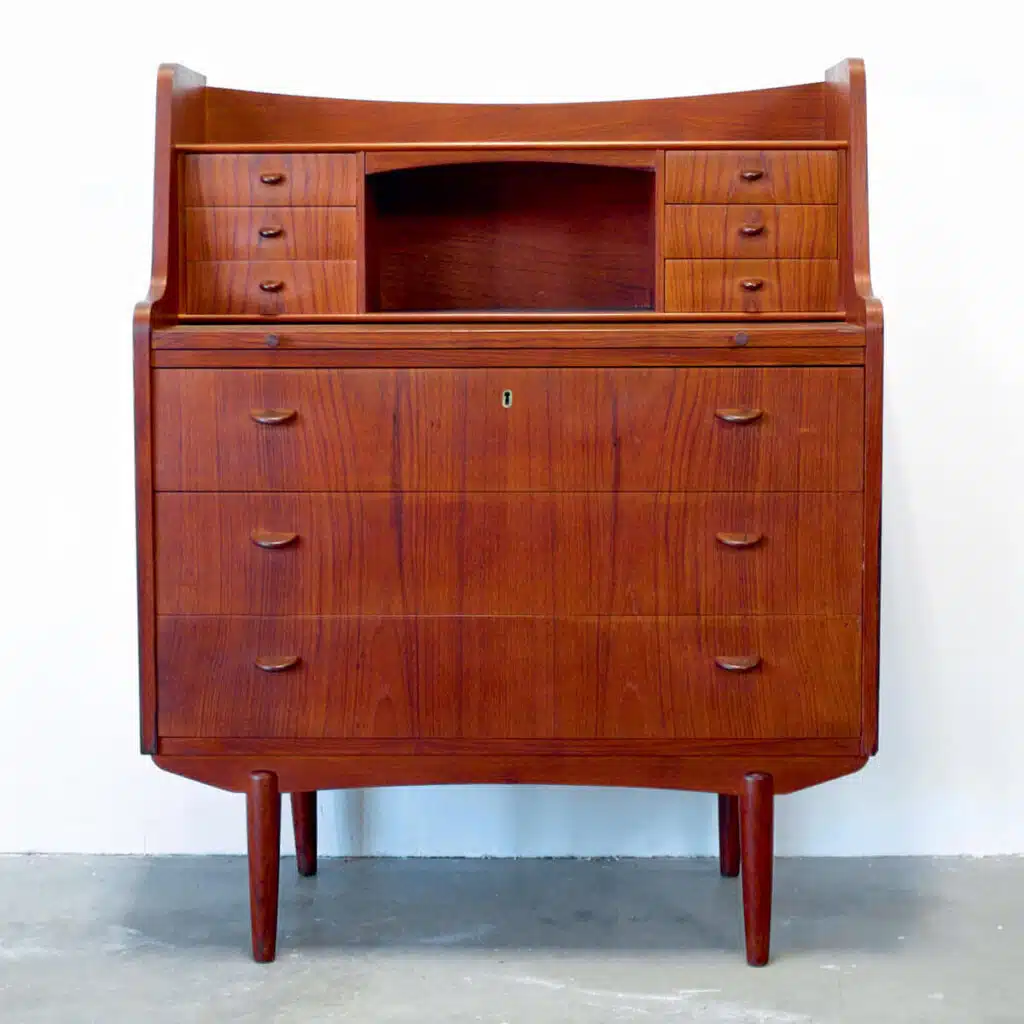 Mid-century modern wooden dresser with multiple drawers, tapered legs, and an open central shelf.