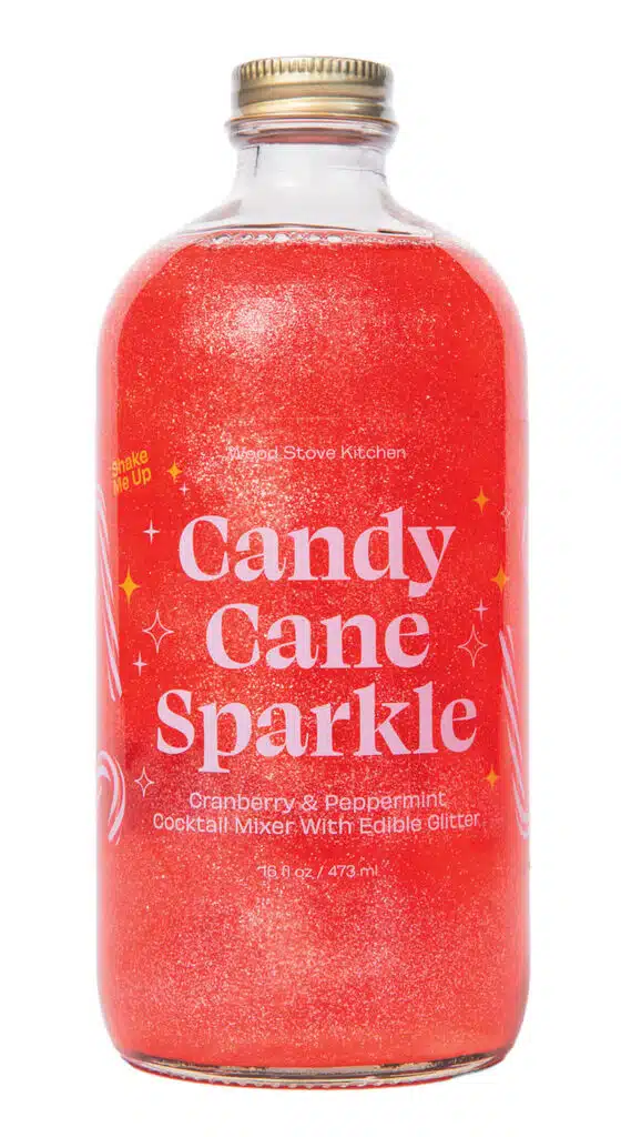 Bottle of red Wood Stove Kitchen Candy Cane Sparkle cocktail mixer with edible glitter.