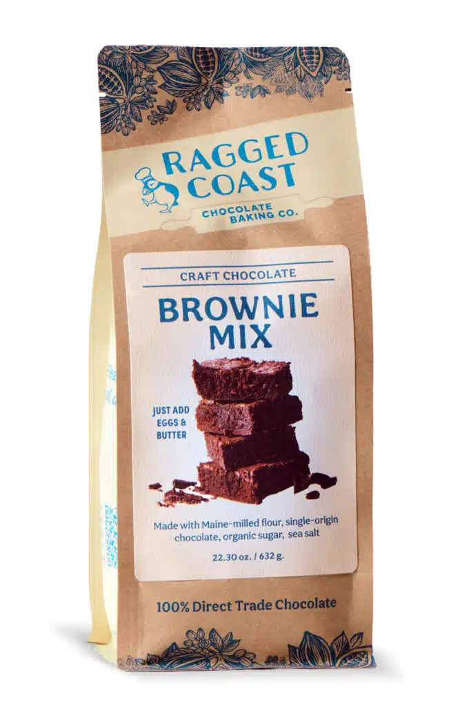Ragged Coast Chocolate Baking Co. brownie mix in a tan paper bag with an image of a stack of brownies.
