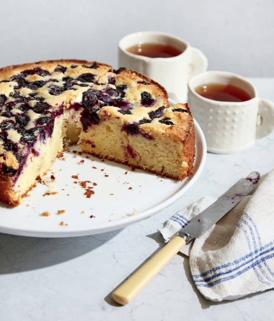 https://newengland.com/wp-content/uploads/Blueberry-lime-cake-877x1024.jpg