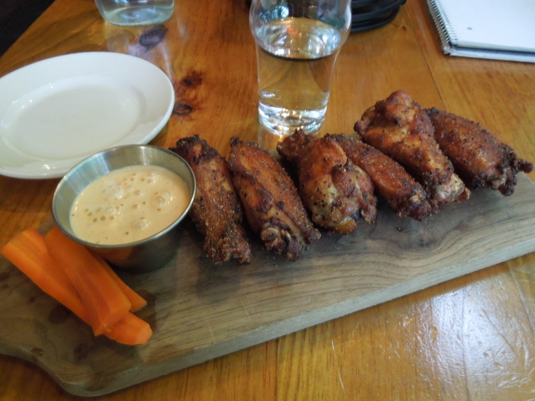 Pitmaster-style wings with Alabama white sauce at Bluebird Barbecue. 