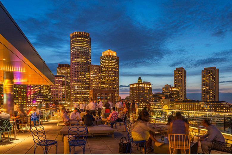 The city skyline seen from the Envoy’s rooftop bar. | Boston Hotels with a View