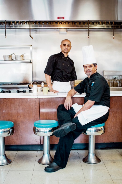 Chef JJ Fernandes (seated) with his son and Caffè general manager Nelson Fernandes. 