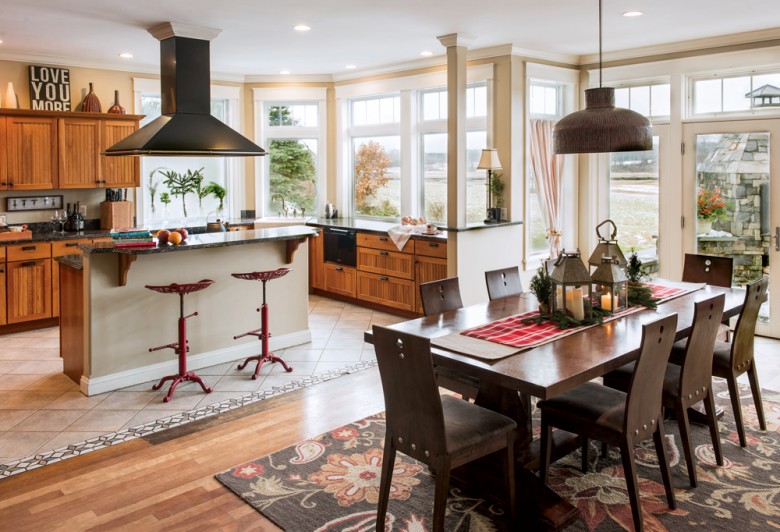 Maine’s biggest salt marsh provides the scenic backdrop for Steve and Michelle Corry’s wide-open kitchen at their Scarborough home.