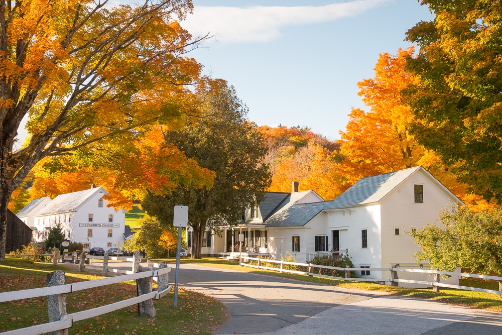 Classic architecture and autumn foliage at its peak at The Calvin Coolidge Homestead in the village of Plymouth Notch, Vermont.