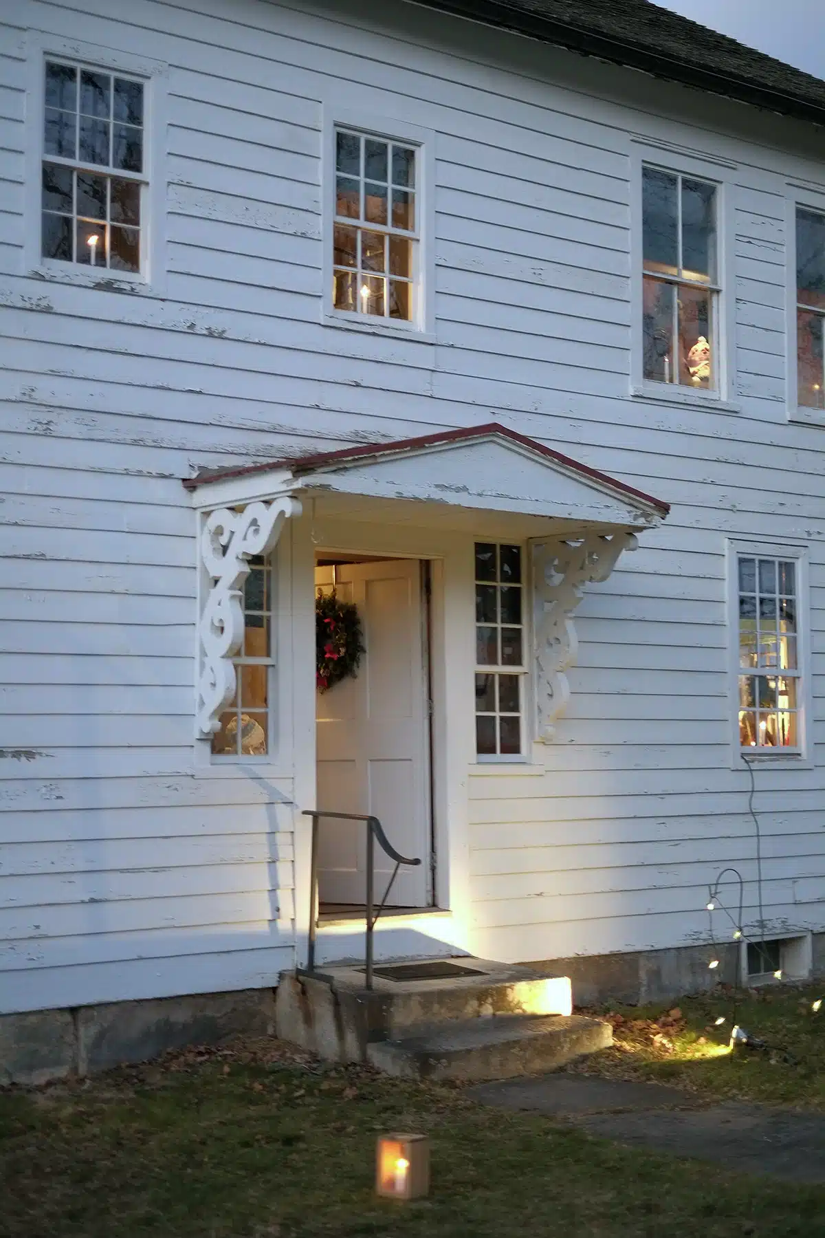 Exterior of the Spin Shop all aglow.