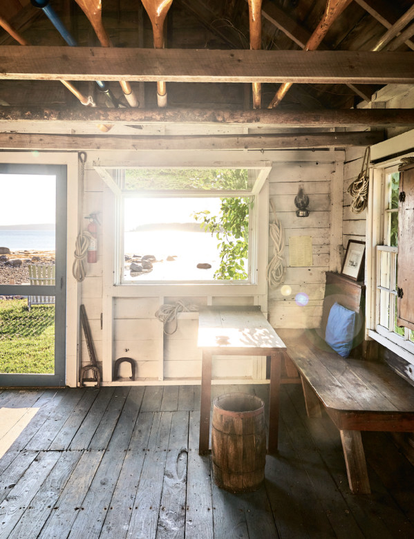 Though the Gallants updated the boathouse decor a bit, they left in place his handmade bench and desk, shown at right.