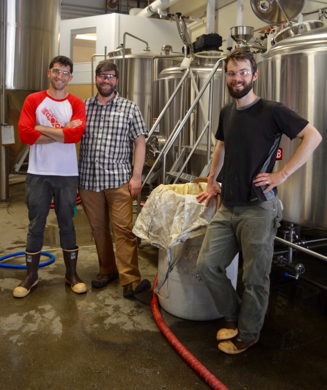 James Hardman (left), Robin Reed, head brewer (center), and John Bonney, co-owner of Foundation Brewing Company.